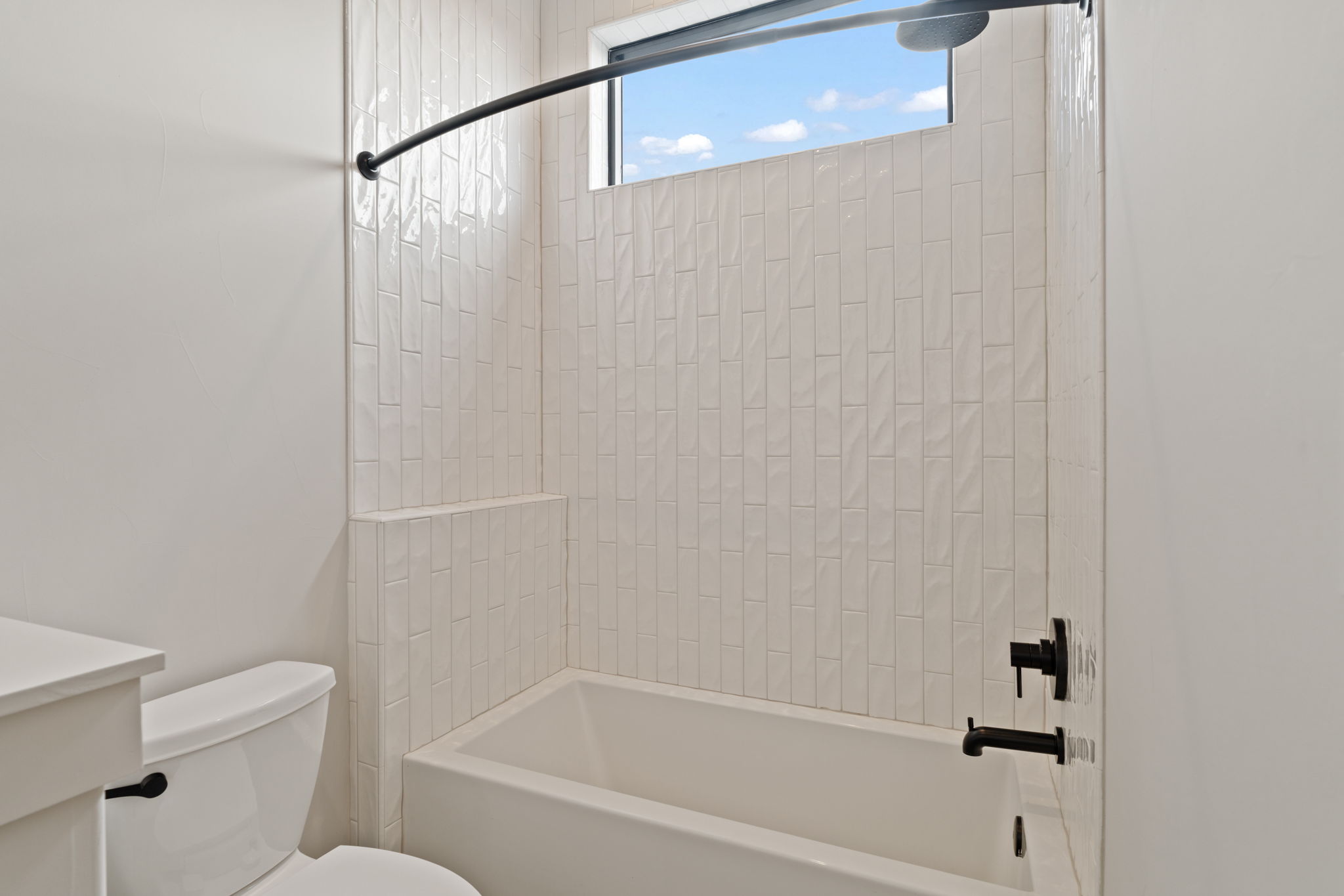 1562 Canyon Crossing View Dripping Springs, TX 78620 - Photo 29 of 40 a bathroom with a shower and a toilet