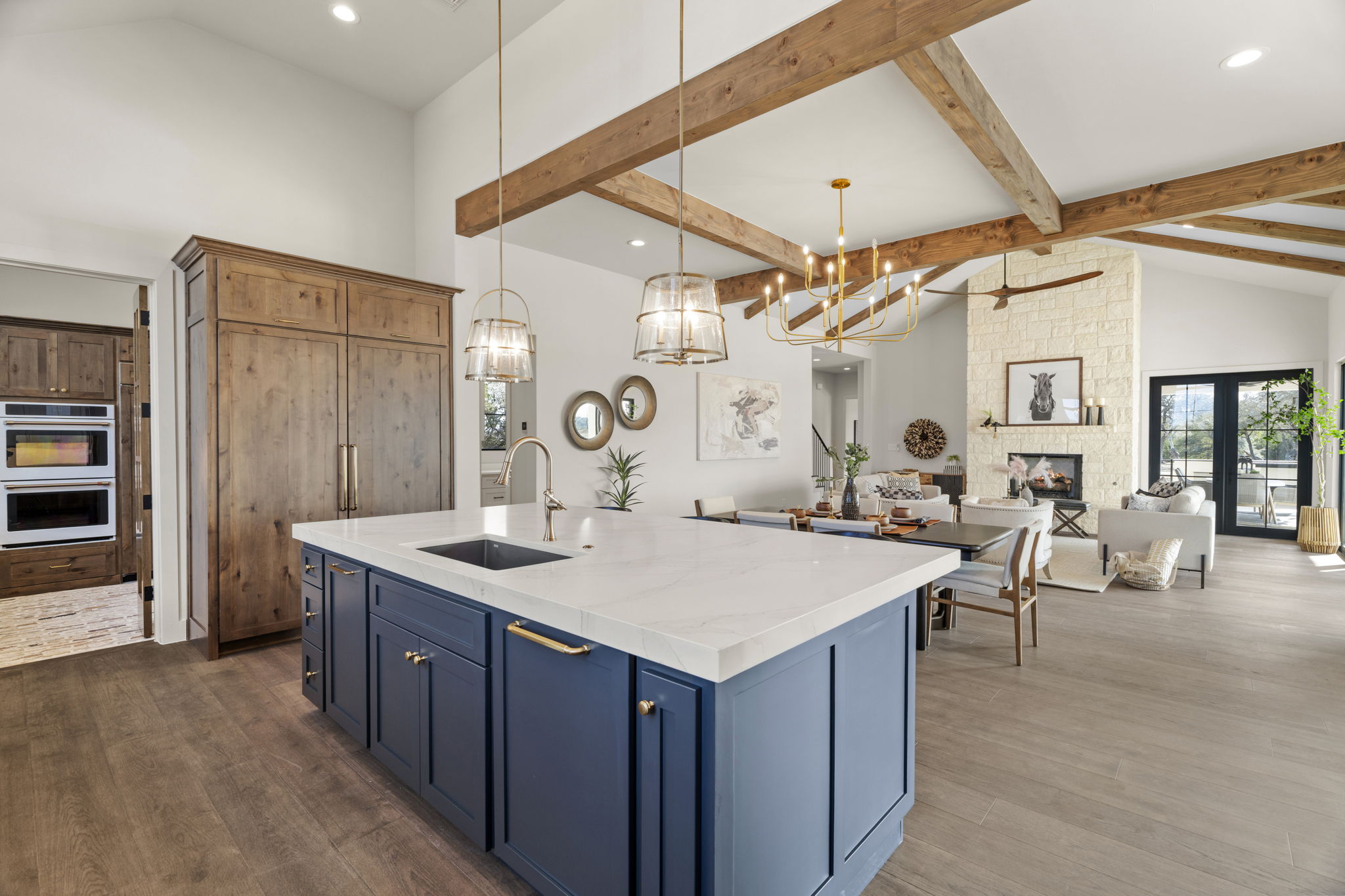 1562 Canyon Crossing View Dripping Springs, TX 78620 - Photo 40 of 40 a large kitchen with a table and chairs