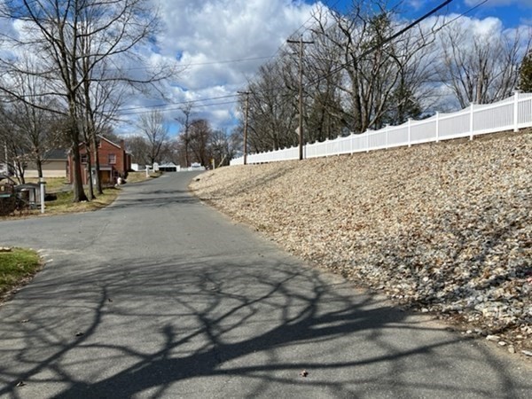 229 Miller Street, Unit C1 Ludlow, MA 01056 - Photo 19 of 19 a view of road and with trees