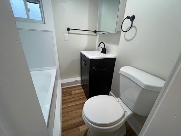 229 Miller Street, Unit C1 Ludlow, MA 01056 - Photo 8 of 19 a bathroom with a toilet and a sink