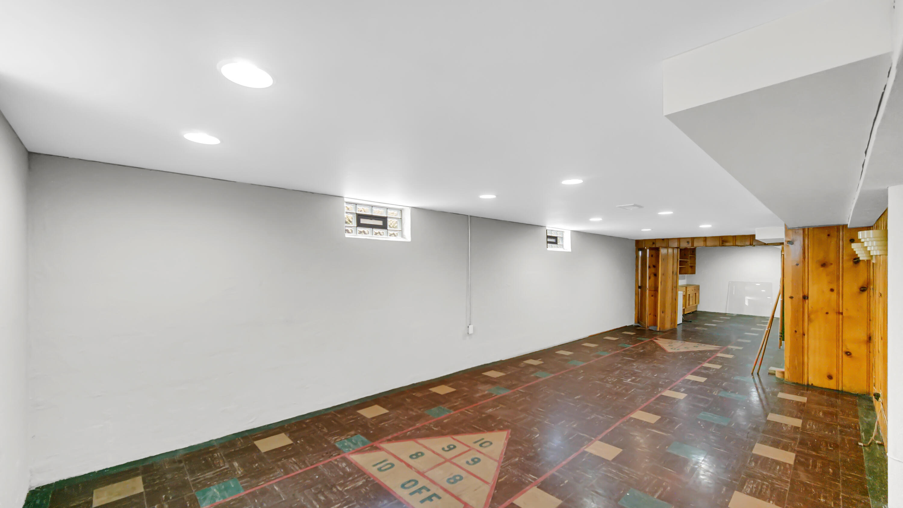6957 Ash Avenue Gary, IN 46403 - Photo 19 of 22 a view of a hallway with wooden floor