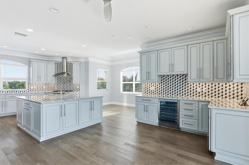 1910 Oregon Trail Englewood, FL 34224 - Photo 20 of 65 a kitchen with granite countertop white cabinets and white appliances