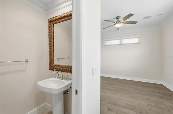 a bathroom with a toilet and a tub