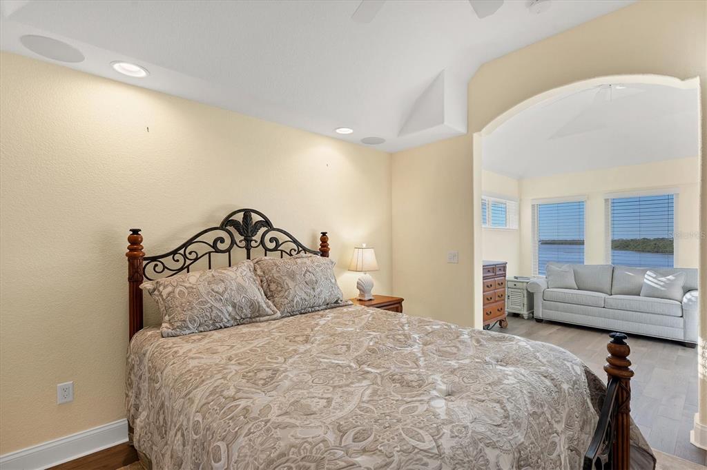 1910 Oregon Trail Englewood, FL 34224 - Photo 42 of 65 a bedroom with a bed and a couch