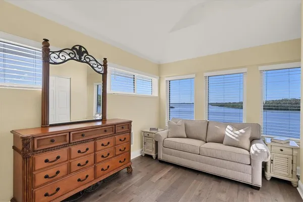 an aerial view of a house with a lake view