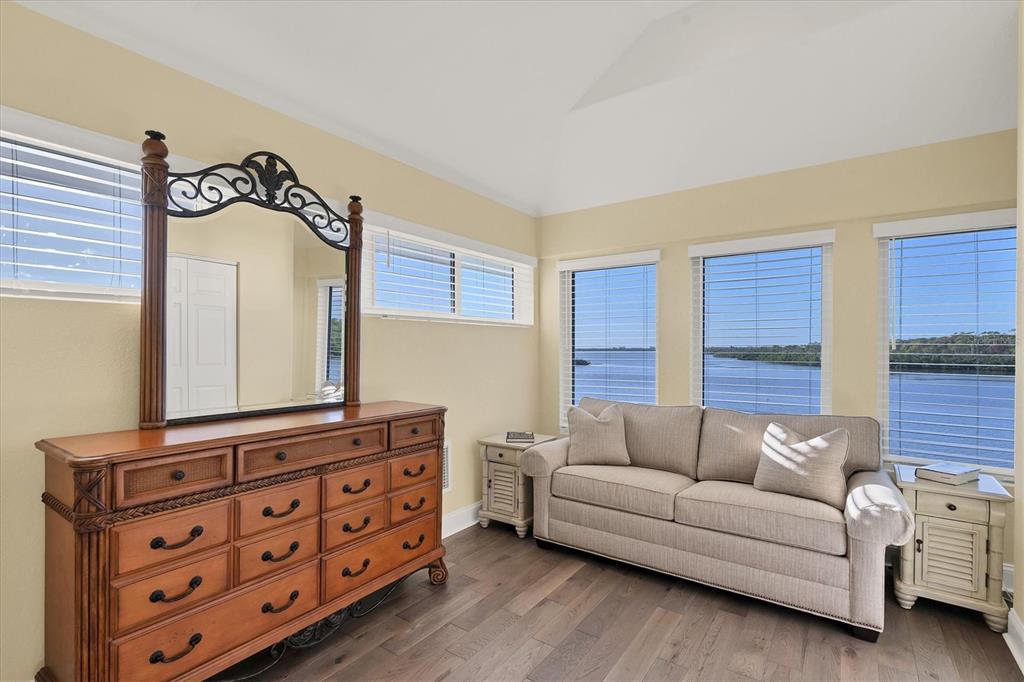 1910 Oregon Trail Englewood, FL 34224 - Photo 44 of 65 a living room with furniture and a mirror
