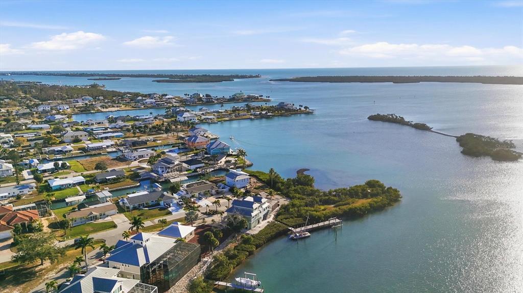 1910 Oregon Trail Englewood, FL 34224 - Photo 60 of 65 an aerial view of ocean and residential houses with outdoor space
