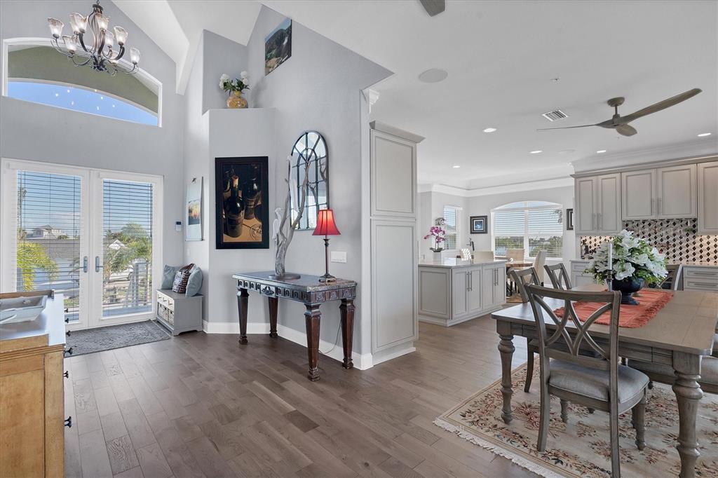 1910 Oregon Trail Englewood, FL 34224 - Photo 7 of 65 a view of a dining room with furniture window and wooden floor