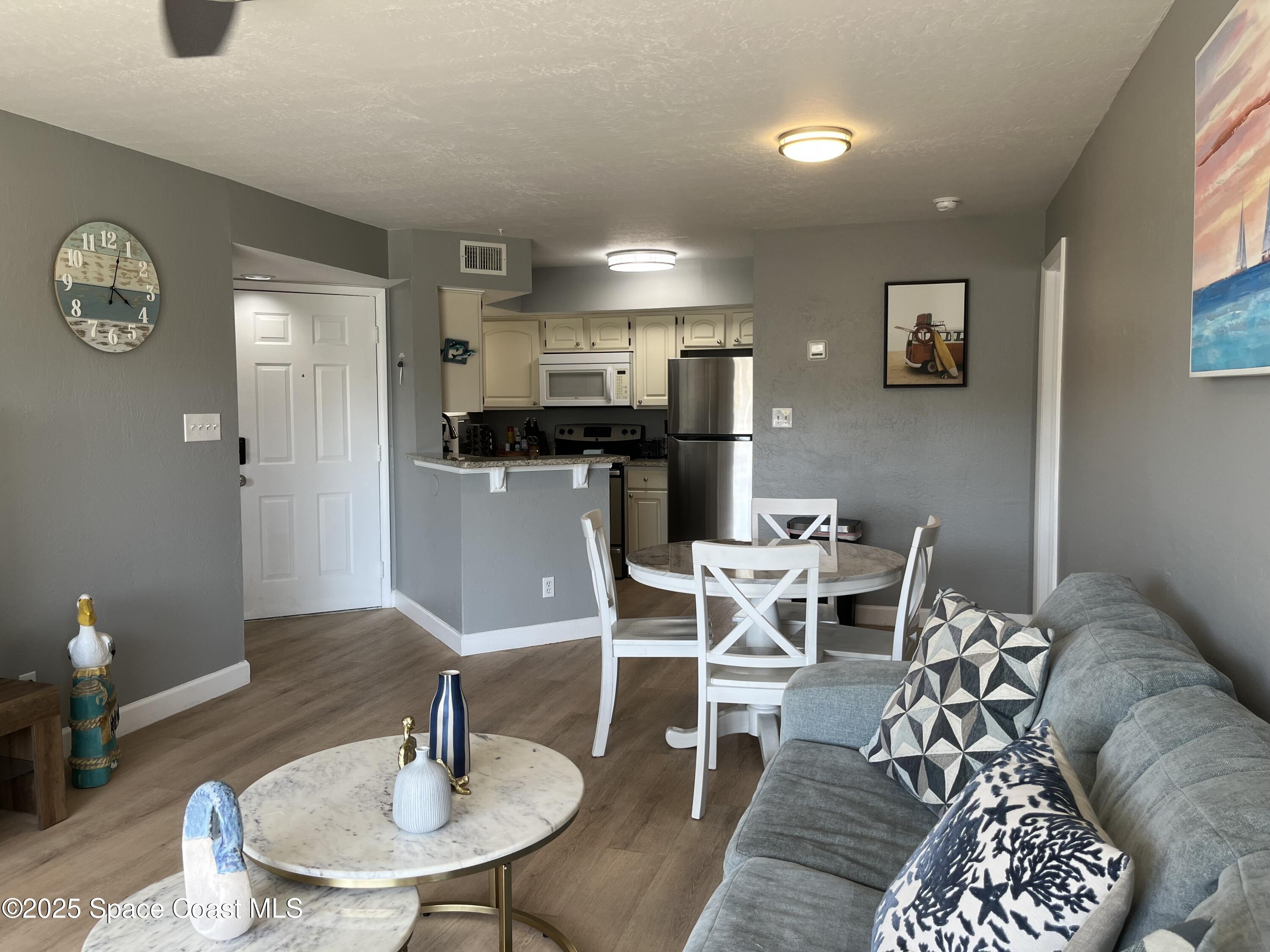 1850 Charlesmont Drive, Unit 7118 Melbourne, FL 32903 - Photo 6 of 13 IMG_2976