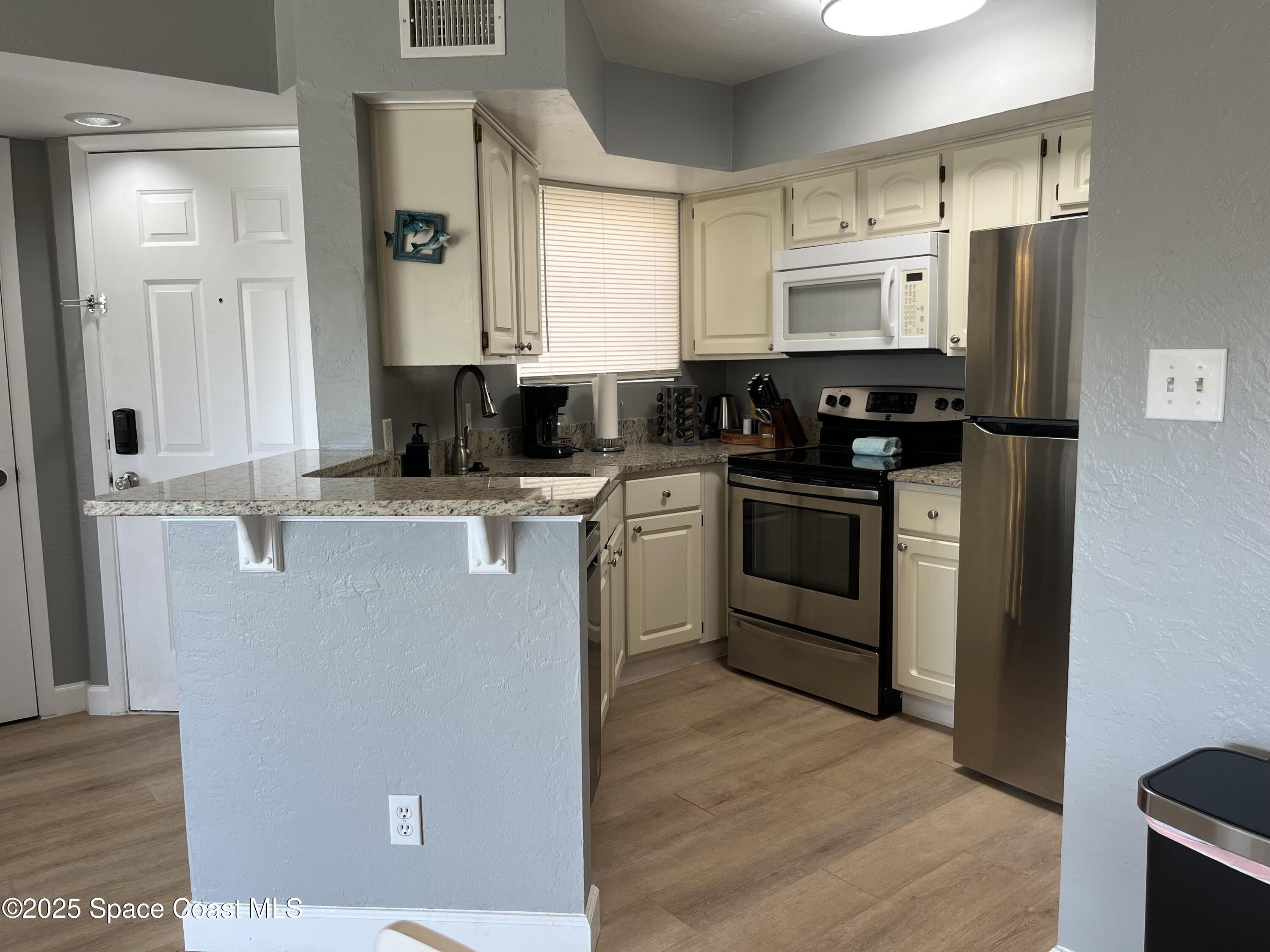 1850 Charlesmont Drive, Unit 7118 Melbourne, FL 32903 - Photo 7 of 13 IMG_2980