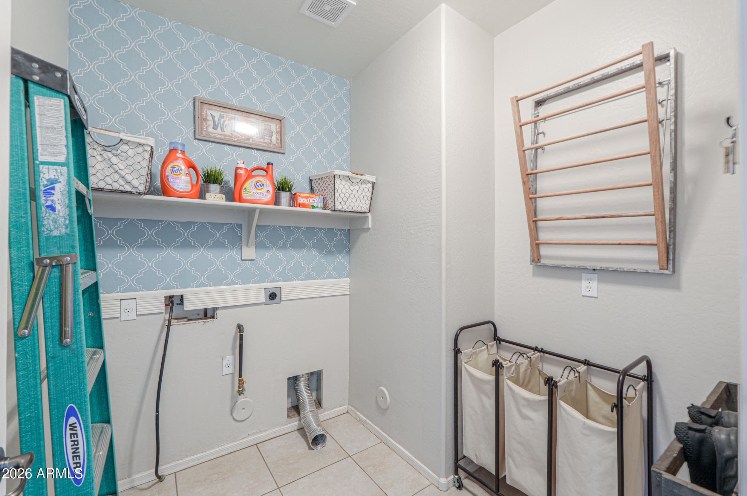45247 West Jack Rabbit Trail Maricopa, AZ 85139 - Photo 28 of 75 a utility room with dryer and washer