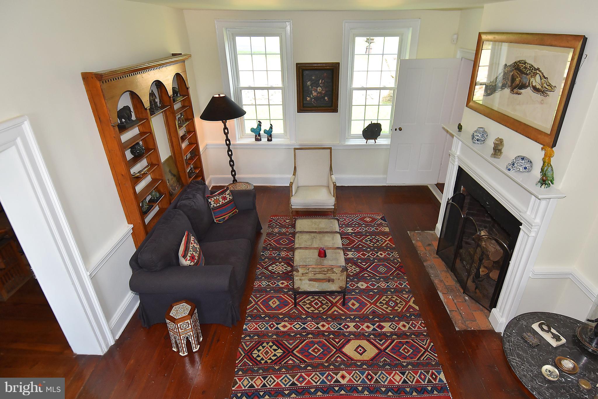 20046 St Louis Road Purcellville, VA 20132 - Photo 14 of 30 a living room with furniture and a fireplace