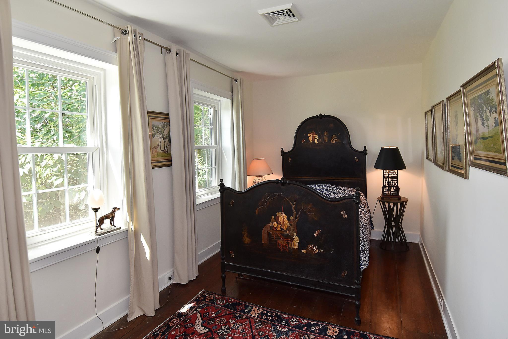 20046 St Louis Road Purcellville, VA 20132 - Photo 22 of 30 a view of a bedroom with a porch