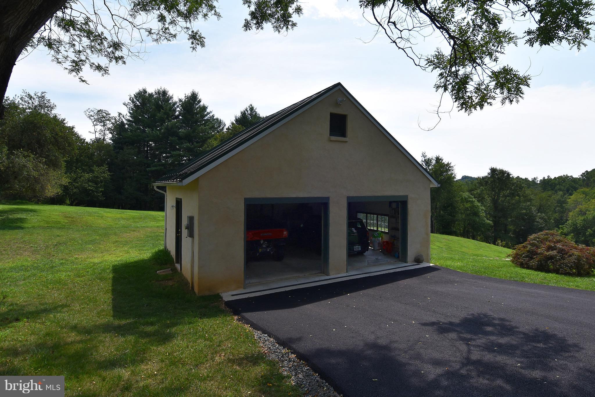 20046 St Louis Road Purcellville, VA 20132 - Photo 24 of 30 a house with garden in front of it