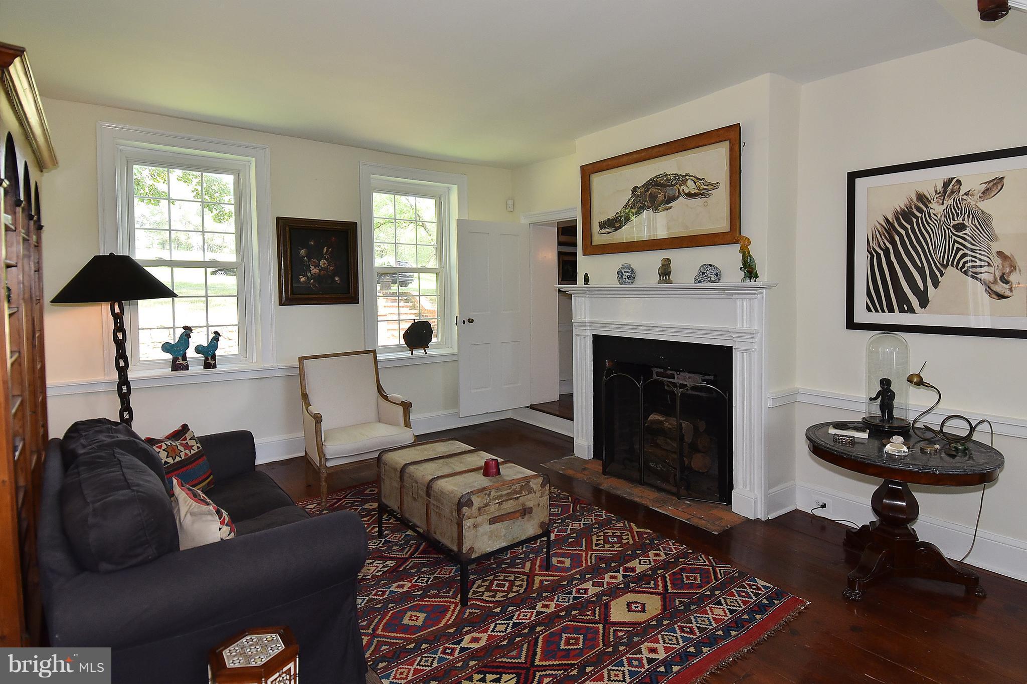 20046 St Louis Road Purcellville, VA 20132 - Photo 6 of 30 a living room with furniture and a fireplace