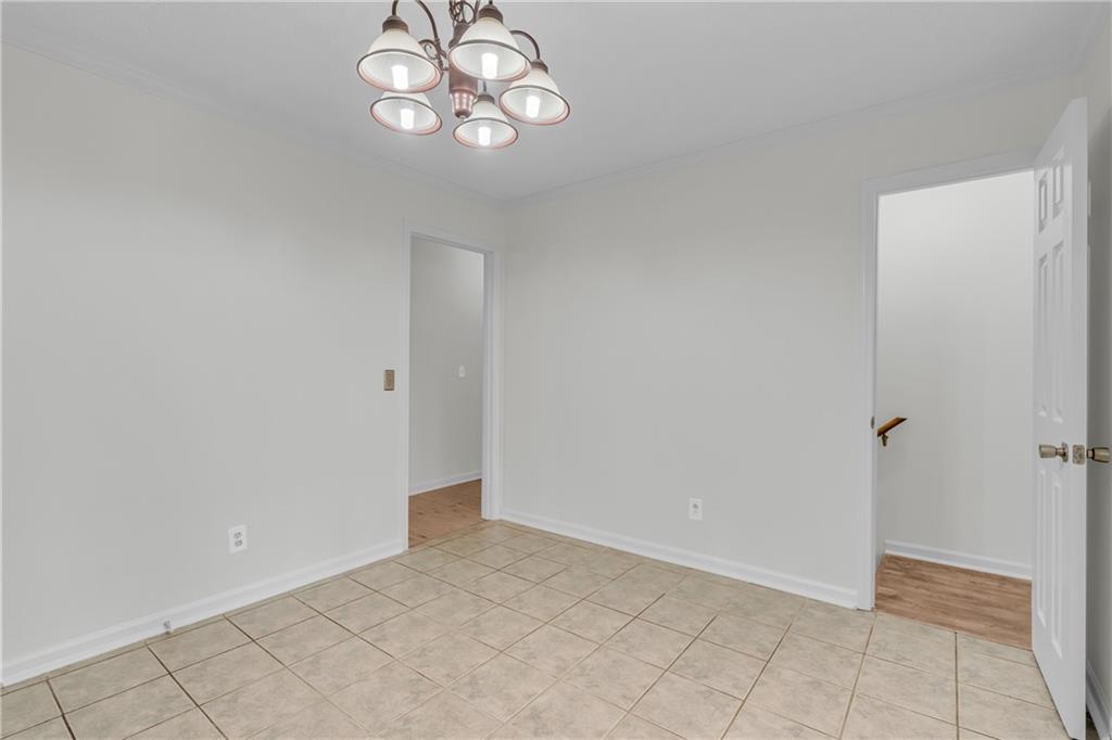 32 Cox Road Southeast Cartersville, GA 30121 - Photo 19 of 60 an empty room with chandelier fan