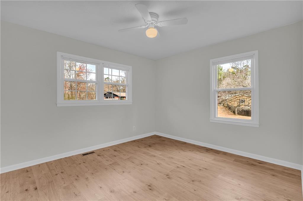 32 Cox Road Southeast Cartersville, GA 30121 - Photo 25 of 60 an empty room with windows