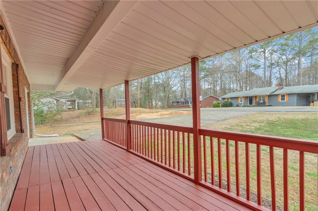 32 Cox Road Southeast Cartersville, GA 30121 - Photo 5 of 60 a view of a balcony with wooden floor