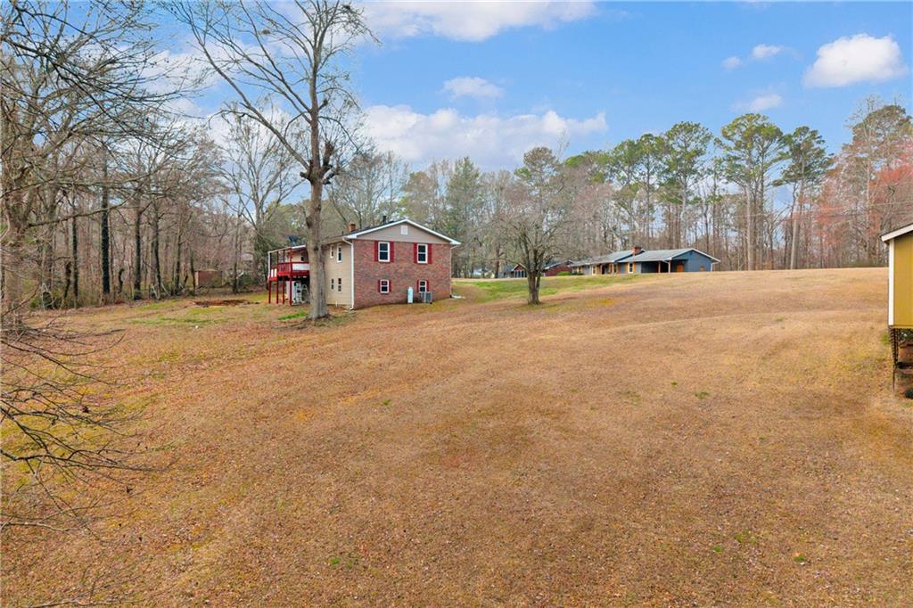 32 Cox Road Southeast Cartersville, GA 30121 - Photo 52 of 60 a view of a field with trees in the background