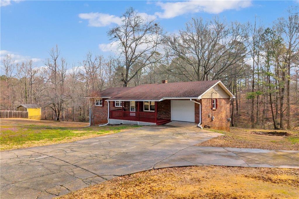 32 Cox Road Southeast Cartersville, GA 30121 - Photo 54 of 60 a view of a house with a yard and large tree