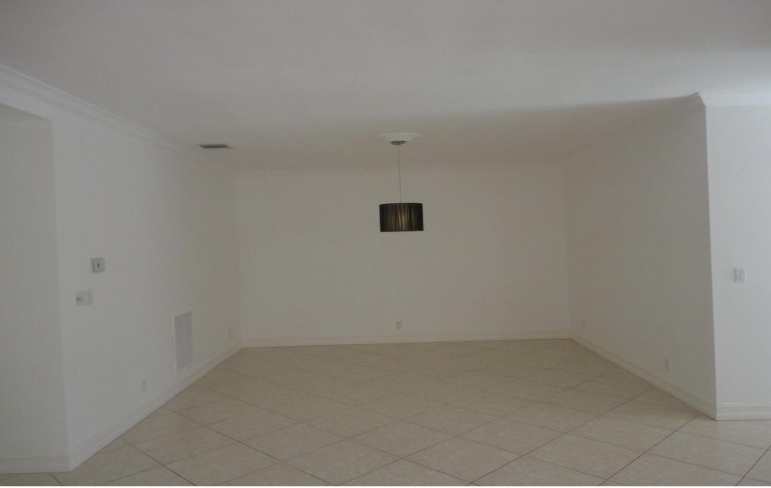 4075 Northwest 58th Street, Unit 1 Boca Raton, FL 33496 - Photo 3 of 27 Family Room