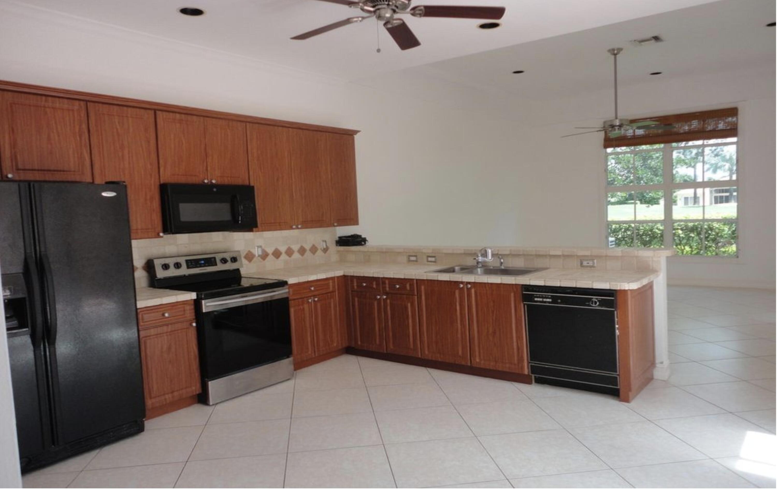 4075 Northwest 58th Street, Unit 1 Boca Raton, FL 33496 - Photo 7 of 27 Kitchen