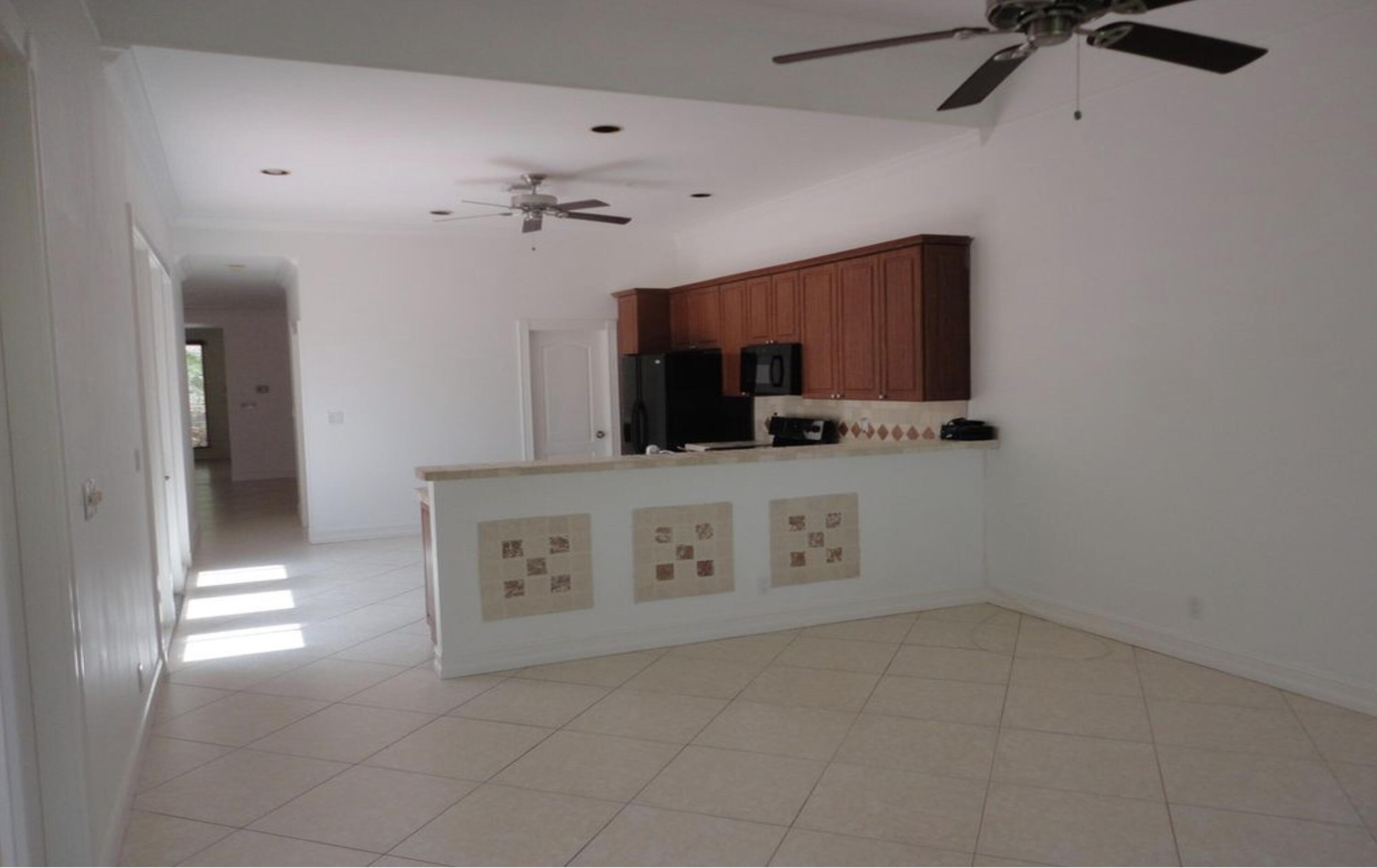 4075 Northwest 58th Street, Unit 1 Boca Raton, FL 33496 - Photo 8 of 27 Kitchen