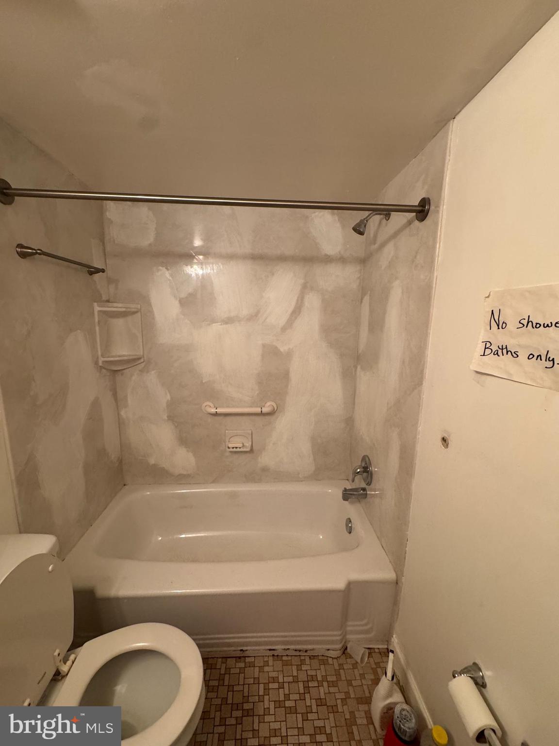 3823 St Barnabas Road, Unit 204 Suitland, MD 20746 - Photo 4 of 6 a bathroom with a sink a toilet and shower