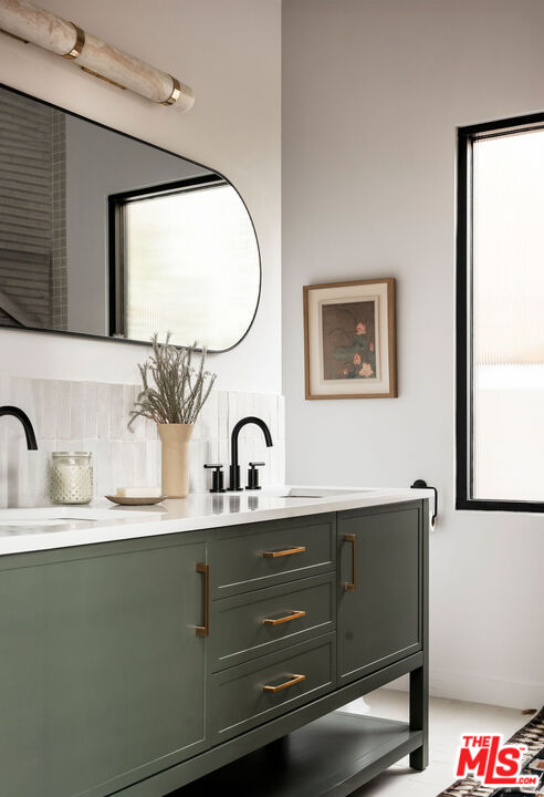 8550 Ridpath Drive Los Angeles, CA 90046 - Photo 17 of 32 a bathroom with a sink and a mirror
