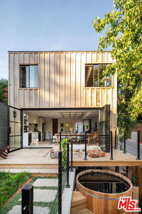 8550 Ridpath Drive Los Angeles, CA 90046 - Photo 24 of 32 a swimming pool view with a outdoor seating