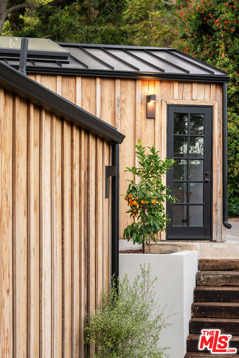 8550 Ridpath Drive Los Angeles, CA 90046 - Photo 29 of 32 a view of a entryway door front of house