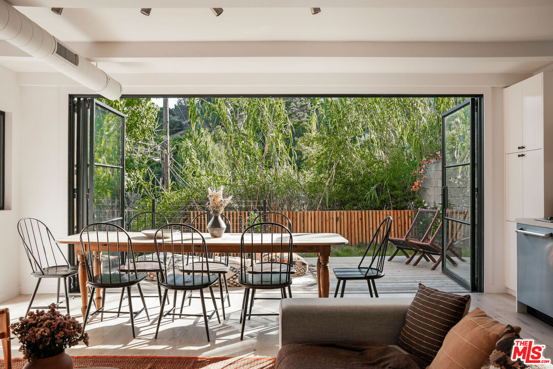 8550 Ridpath Drive Los Angeles, CA 90046 - Photo 7 of 32 a outdoor living space with furniture and garden view
