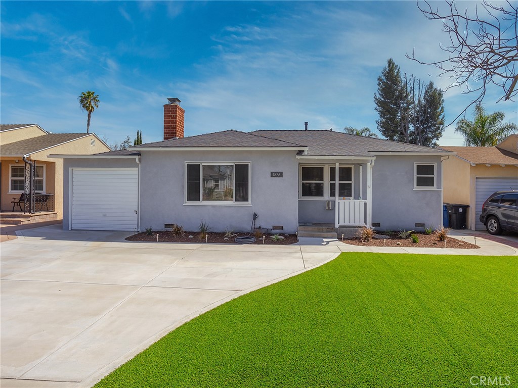 1826 North Maple Street Burbank, CA 91505 - Photo 1 of 1 a front view of house with yard and green space