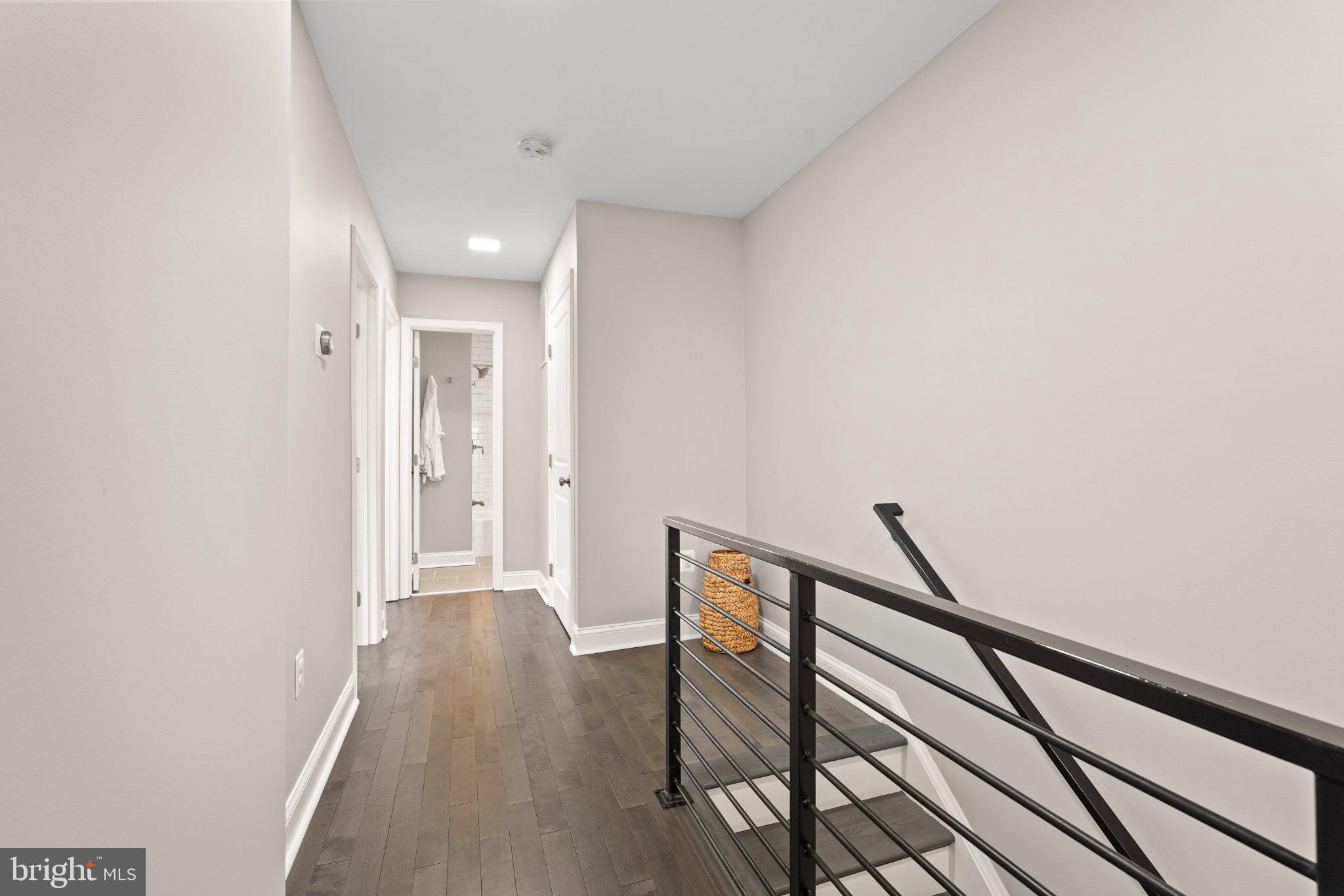 4416 Gault Place Northeast Washington, DC 20019 - Photo 14 of 30 a view of a hallway with wooden floor