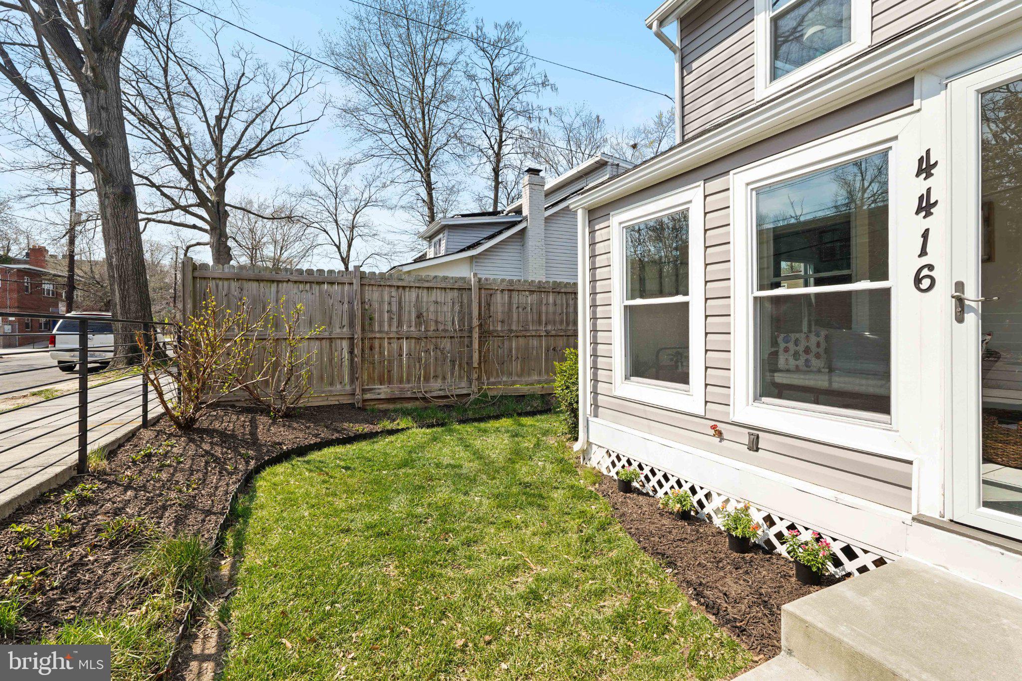 4416 Gault Place Northeast Washington, DC 20019 - Photo 2 of 30 a view of a backyard with a garden