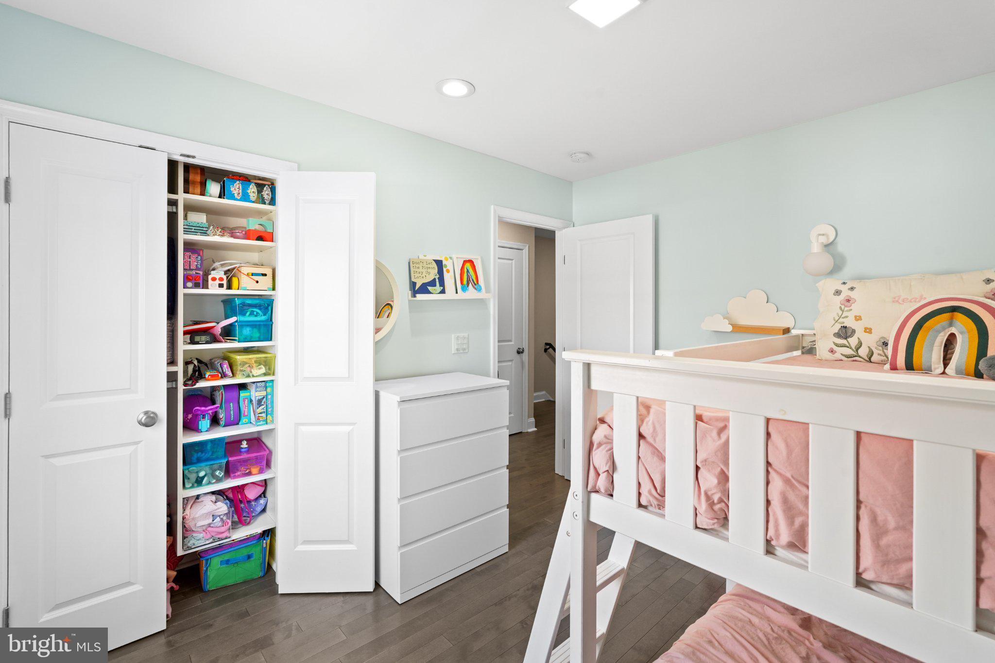 4416 Gault Place Northeast Washington, DC 20019 - Photo 22 of 30 a bedroom with a bed and storage