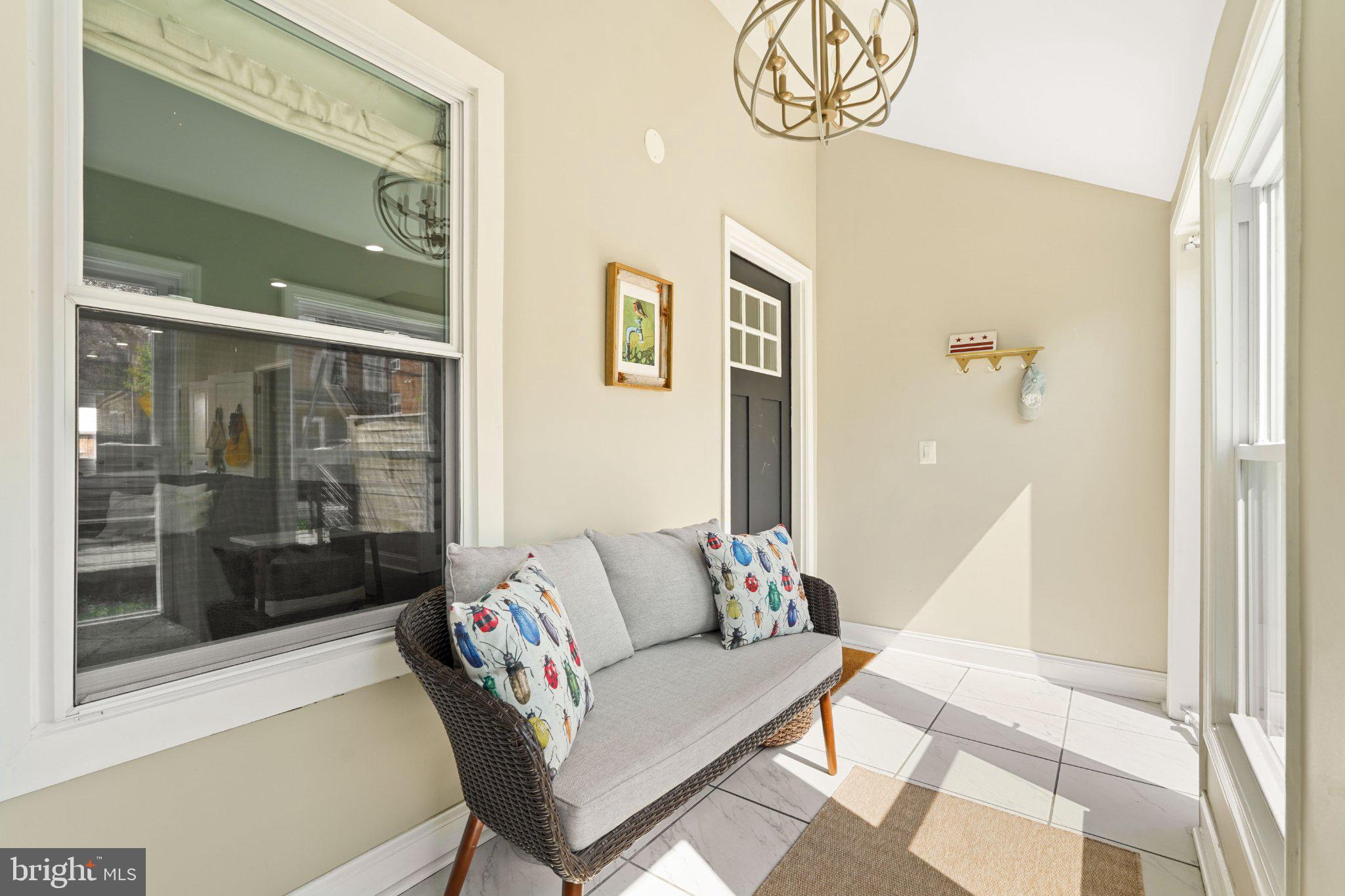4416 Gault Place Northeast Washington, DC 20019 - Photo 4 of 30 a living room with furniture and a floor to ceiling window