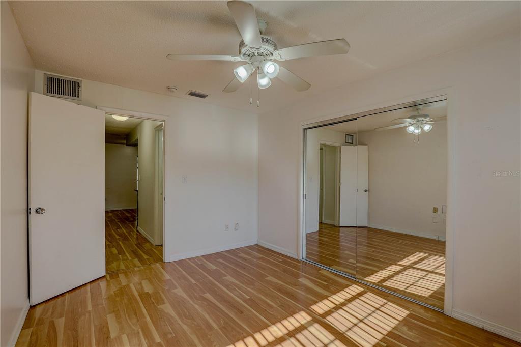 864 Lake Haven Road Dunedin, FL 34698 - Photo 13 of 28 a view of an empty room