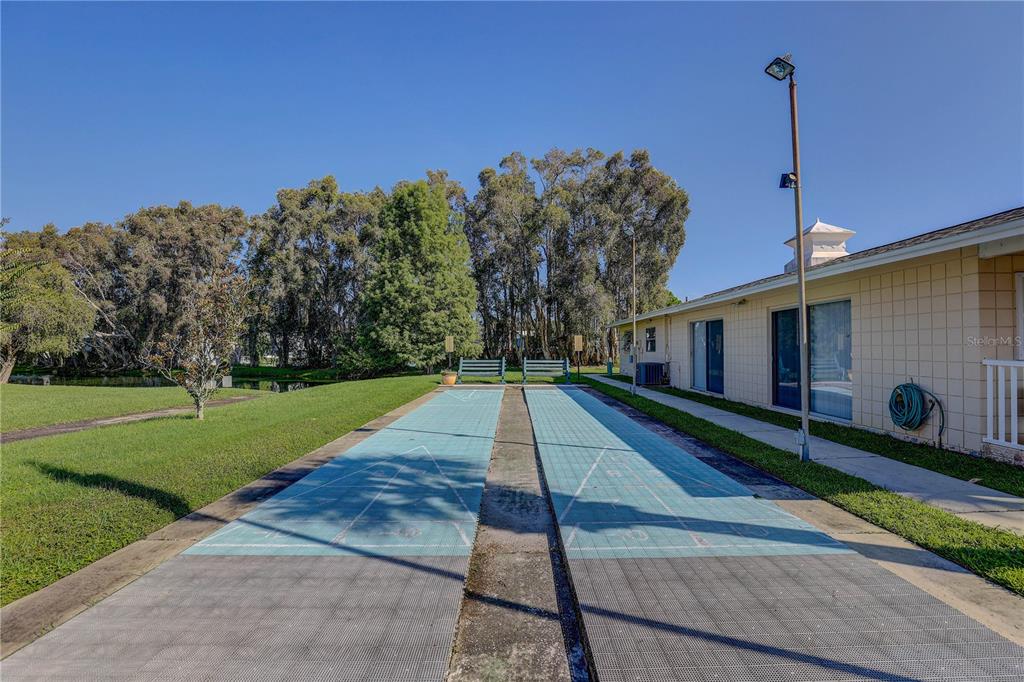 864 Lake Haven Road Dunedin, FL 34698 - Photo 24 of 28 a house view with a garden space
