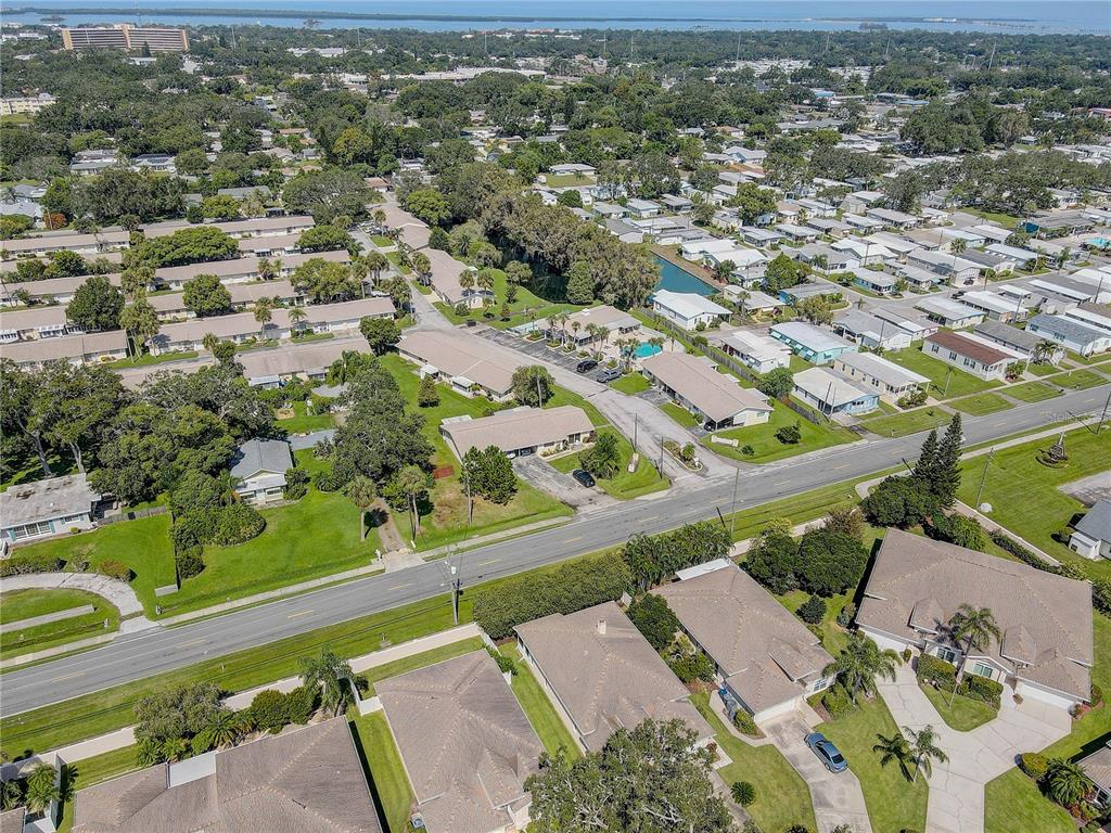 864 Lake Haven Road Dunedin, FL 34698 - Photo 25 of 28 an aerial view of residential houses with outdoor space