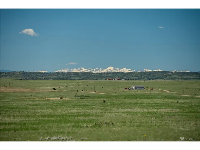 a view of a street with an outdoor space