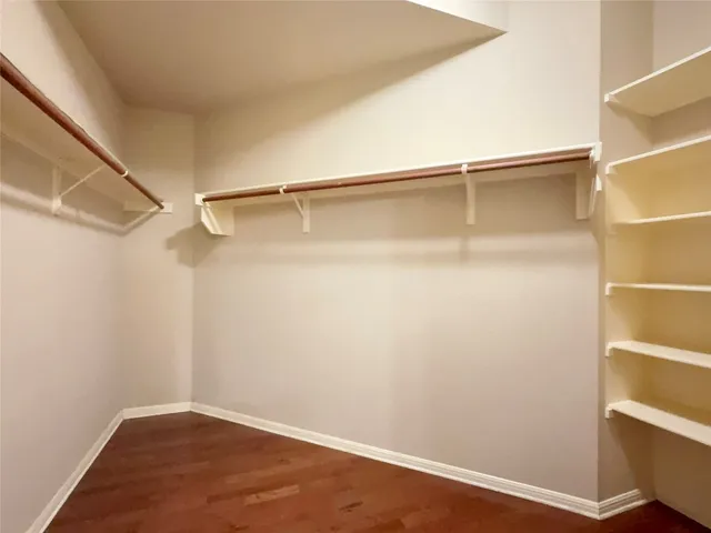 a view of an empty walk in closet