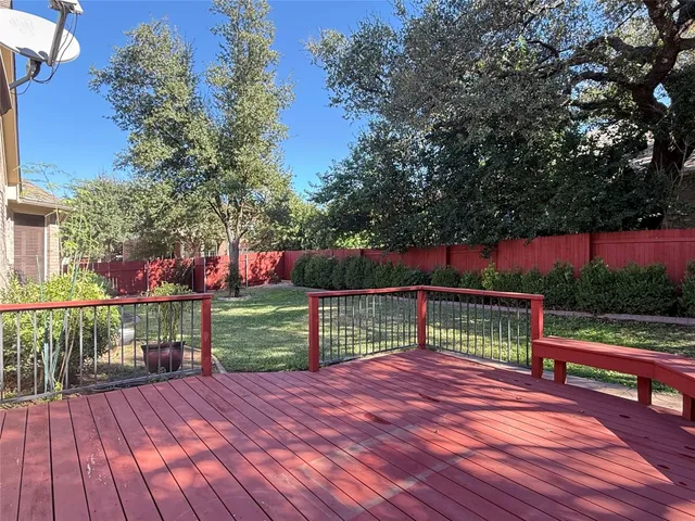 a view of a deck with a large swimming pool