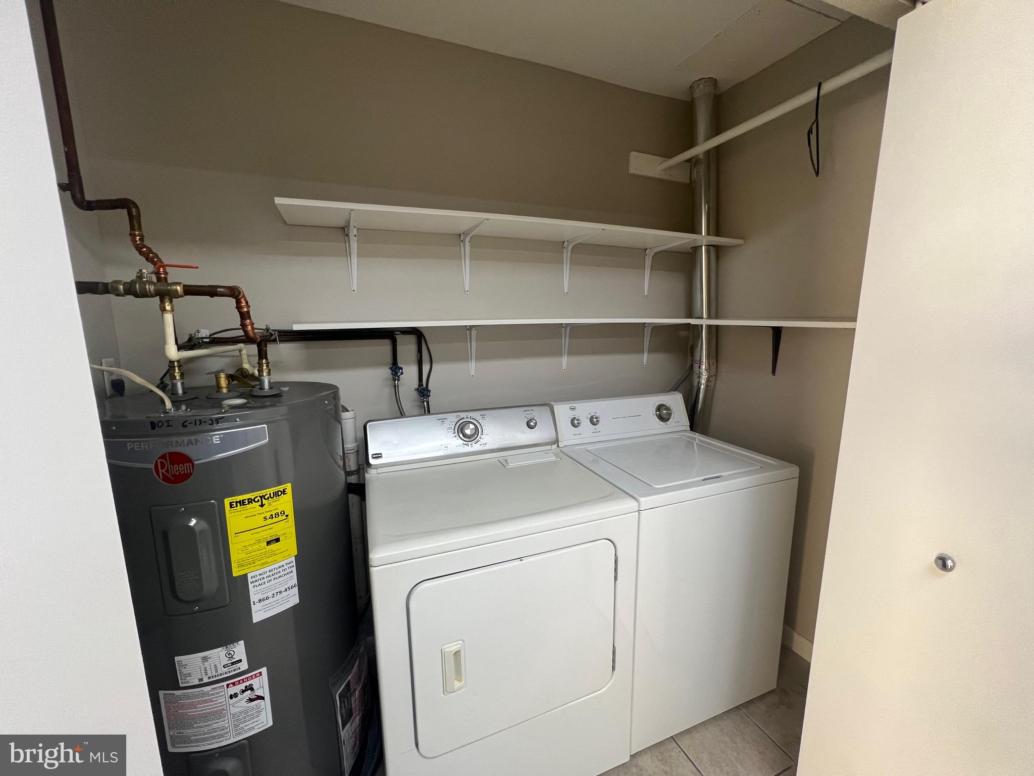 43 Taos Circle Middle River, MD 21220 - Photo 4 of 11 a utility room with dryer and washer