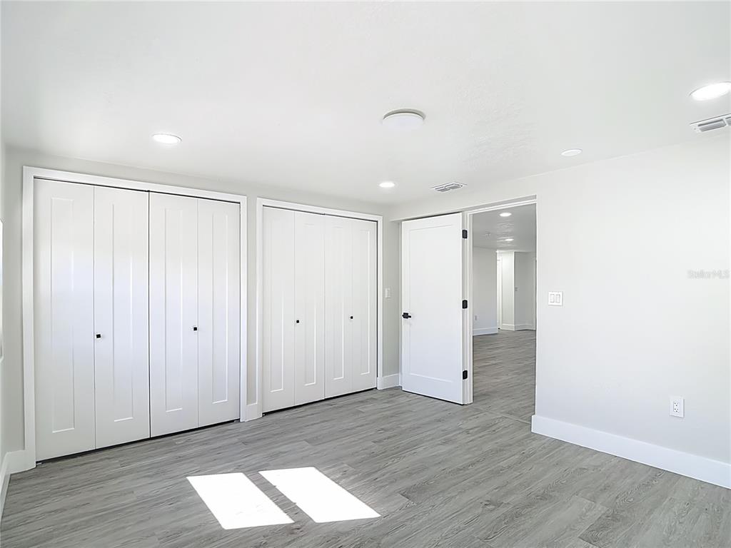 8130 San Felipe Court Port Richey, FL 34668 - Photo 32 of 54 a view of entryway with wooden floor