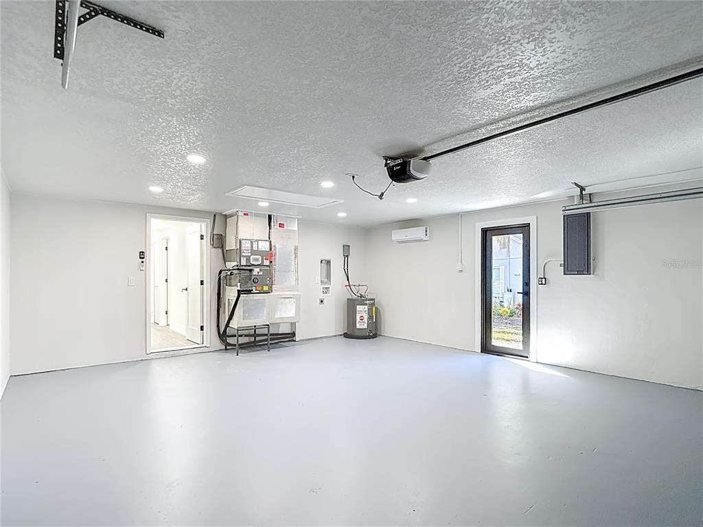 8130 San Felipe Court Port Richey, FL 34668 - Photo 42 of 54 a view of a big room with wooden floor