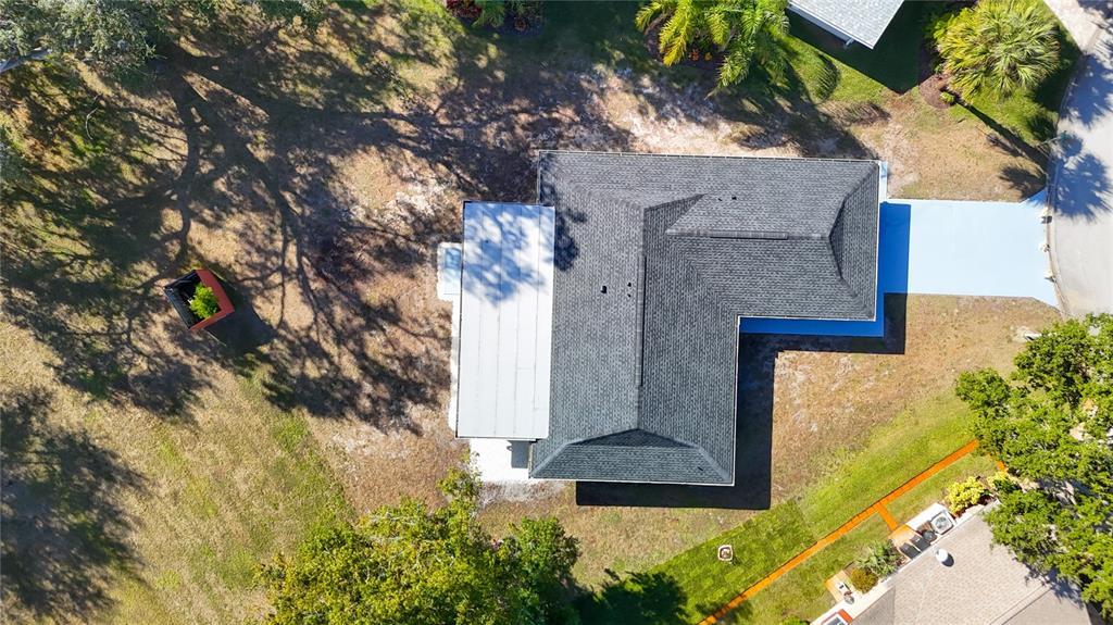 8130 San Felipe Court Port Richey, FL 34668 - Photo 50 of 54 front view of a house with a yard