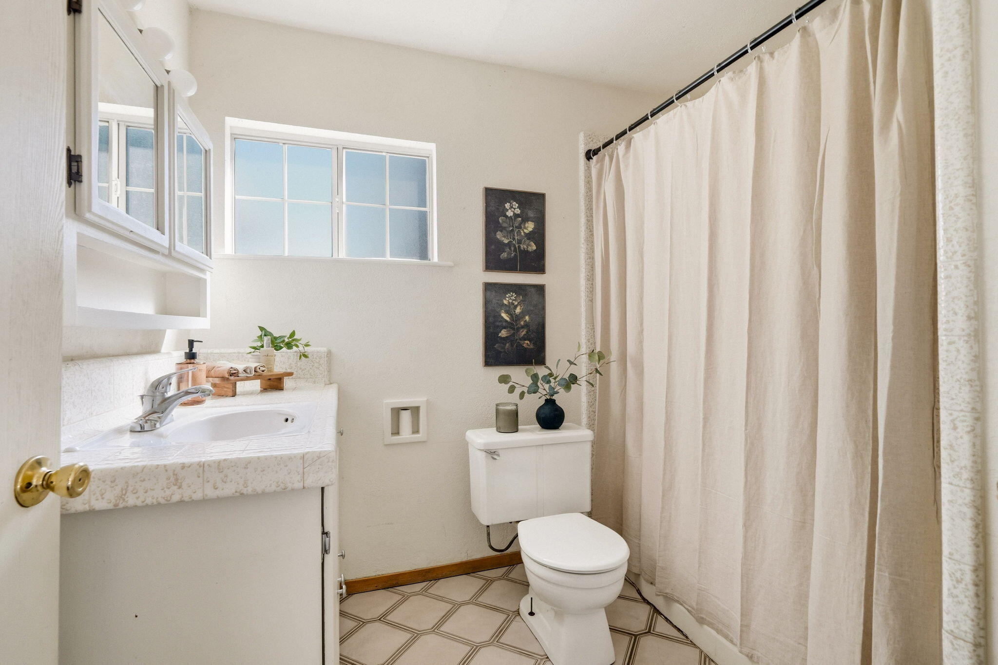 5941 Oak Street Anderson, CA 96007 - Photo 11 of 14 a bathroom with a sink toilet and shower