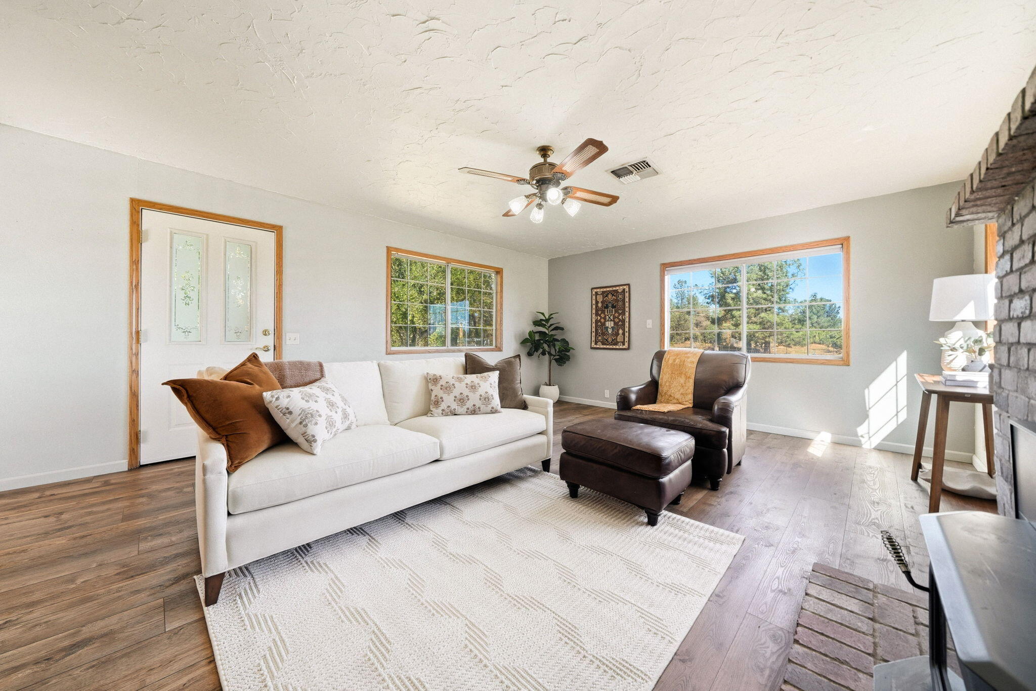 5941 Oak Street Anderson, CA 96007 - Photo 2 of 14 a living room with furniture and a large window