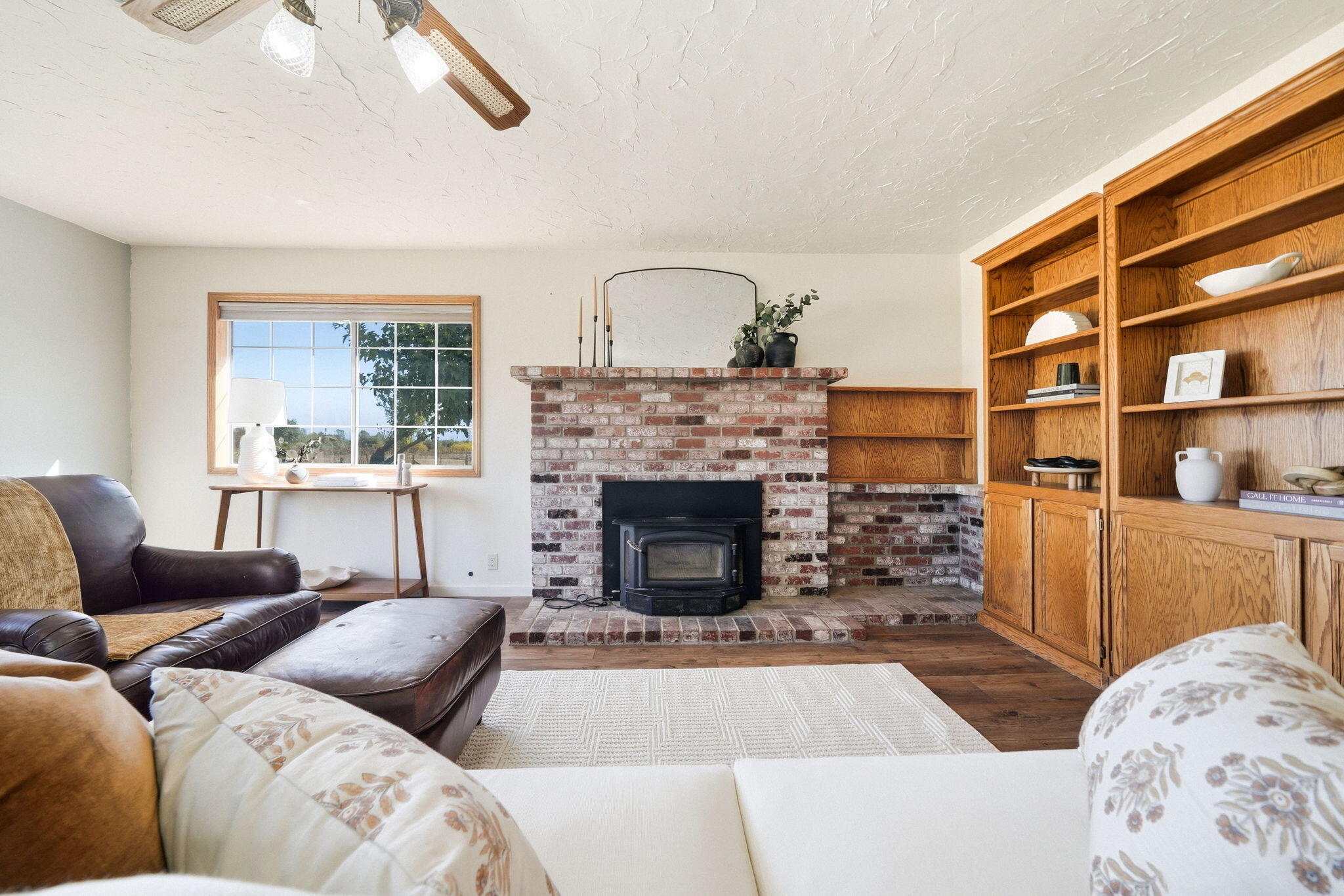 5941 Oak Street Anderson, CA 96007 - Photo 3 of 14 a living room with furniture and a fireplace
